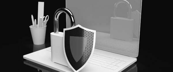 Laptop with lock and shield symbol