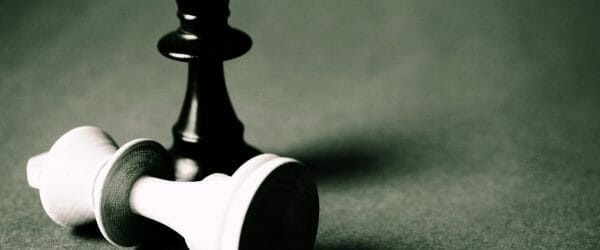 black queen chess piece standing