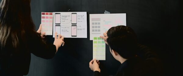 Designers collaborating on user interface mockups